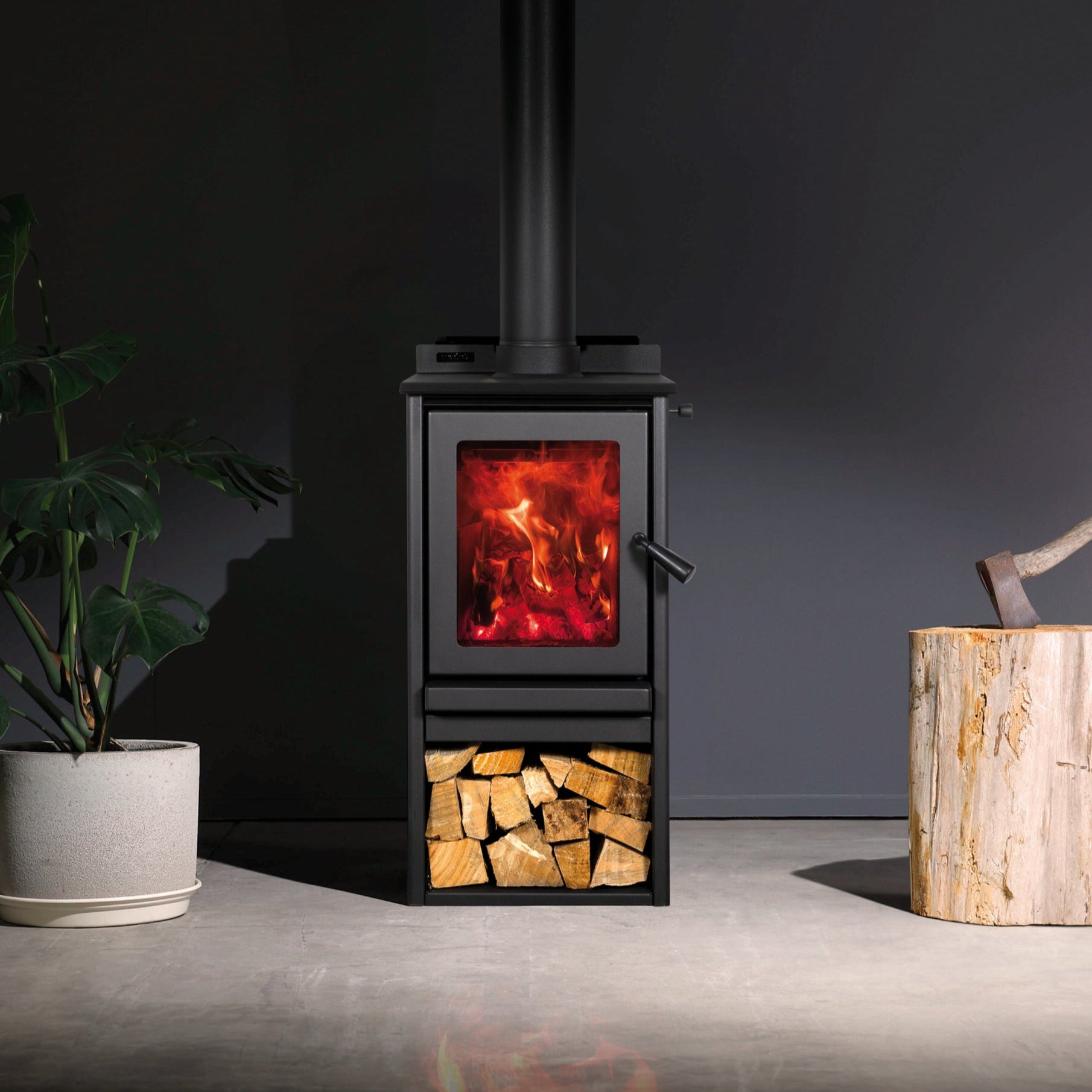Metro Rad One wood fire with sleek metallic black finish and ROBAX® NightView glass, ideal for tiny homes and small spaces