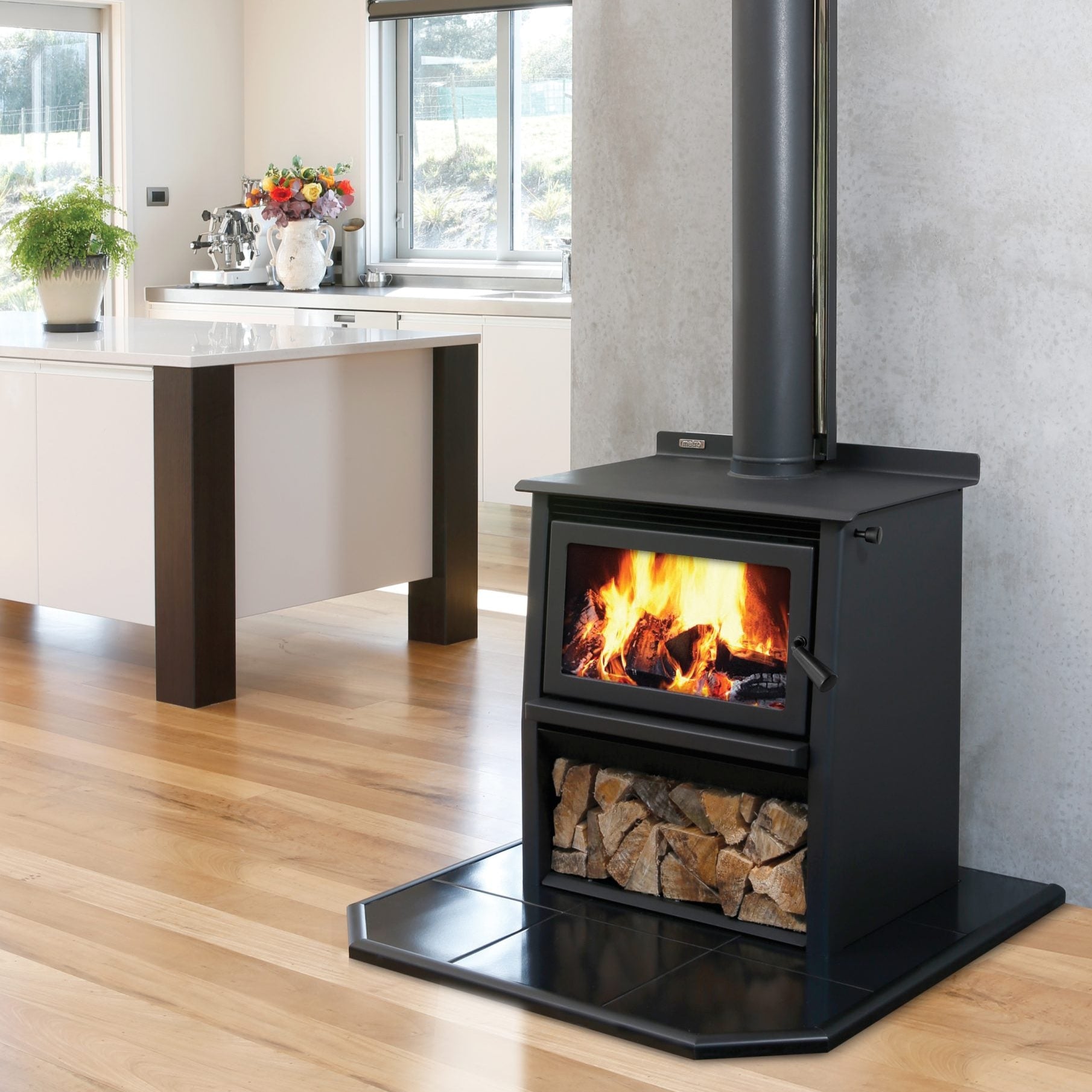 Metro Xtreme Rad Woody wood fire with large flame view and log storage – powerful home heating solution from Turfrey NZ