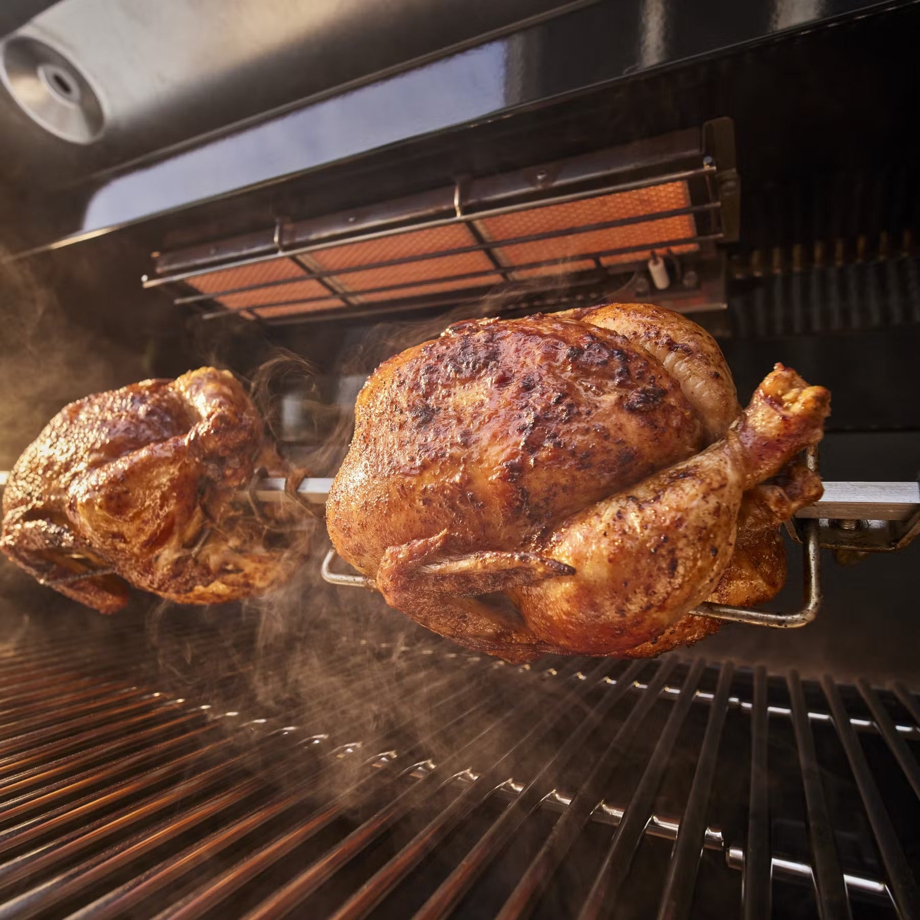 Weber Summit Built-In 5 burner gas barbecue in outdoor kitchen
