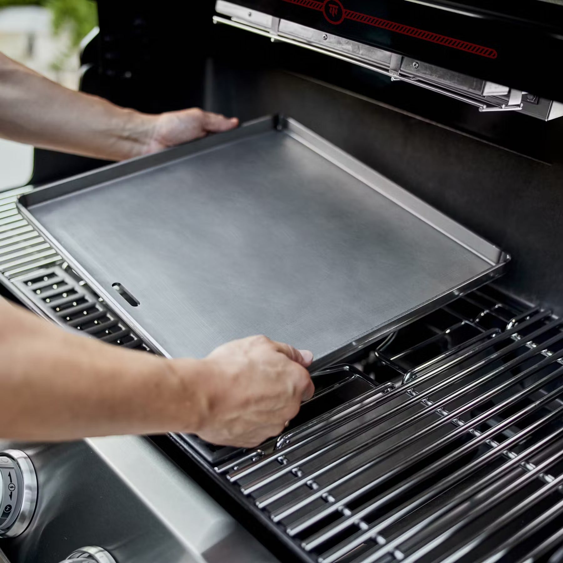 Weber Summit Built-In 5 burner gas barbecue in outdoor kitchen