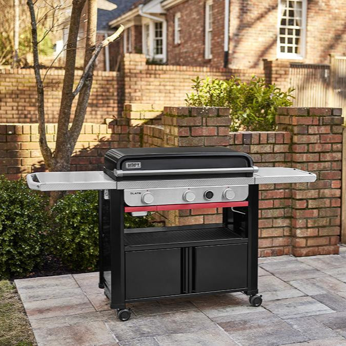 Weber Slate Premium 30” Griddle – rust-resistant carbon steel cooktop with digital temperature display and Weber Works storage system.