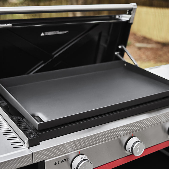 Weber Slate 30-inch Griddle BBQ with 3 burners, rust-resistant cooktop, even heat distribution, and Weber Works™ storage system – perfect for outdoor cooking.